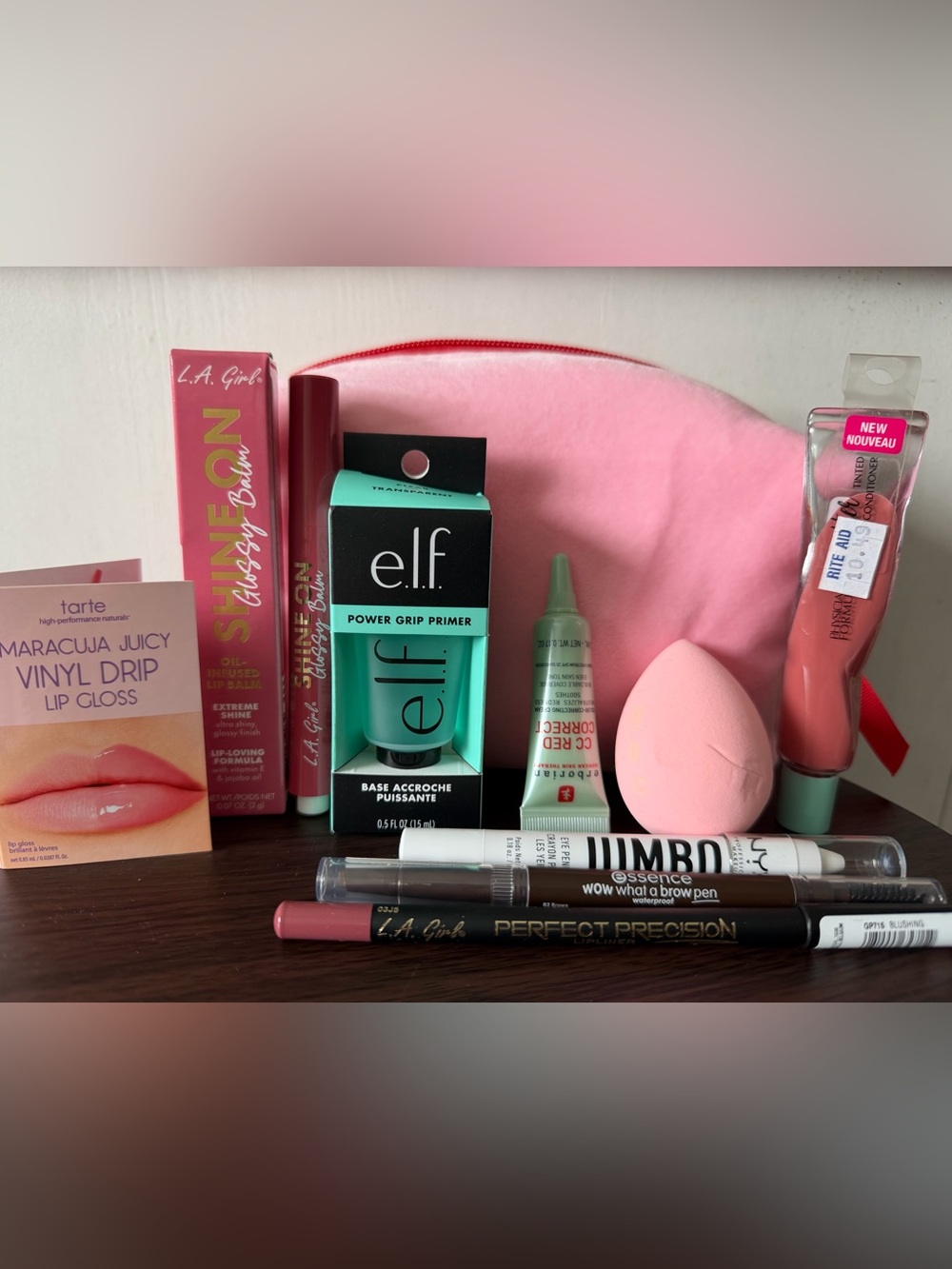 New 10 piece Makeup products (lipstick,primer & eyebrow, Makeup bag & more)